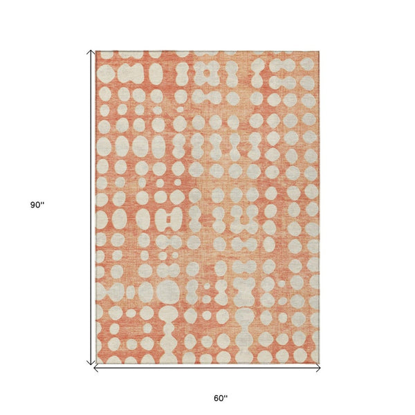 HomeRoots 5' Coral and Ivory Abstract Area Rug – Durable, Washable Design for Indoor and Outdoor Spaces 5' X 8' 590938