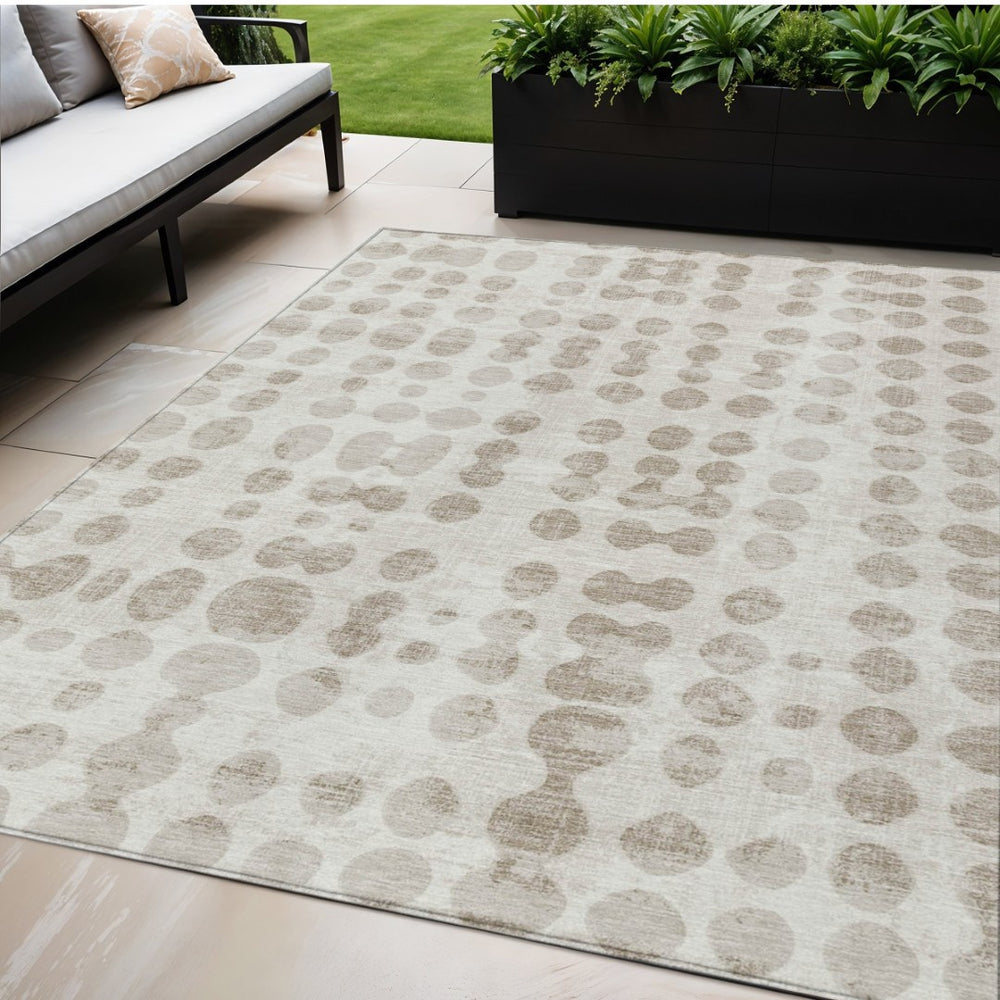 HomeRoots 5' Ivory and Beige Abstract Area Rug - Modern, Washable, Durable Design for Indoor and Outdoor Use 5' X 8' 590956
