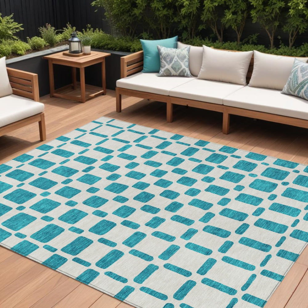 HomeRoots 5' Teal Blue and Ivory Geometric Area Rug – Stylish, Washable Indoor/Outdoor Rug for High Traffic Areas 8' X 10' 591150