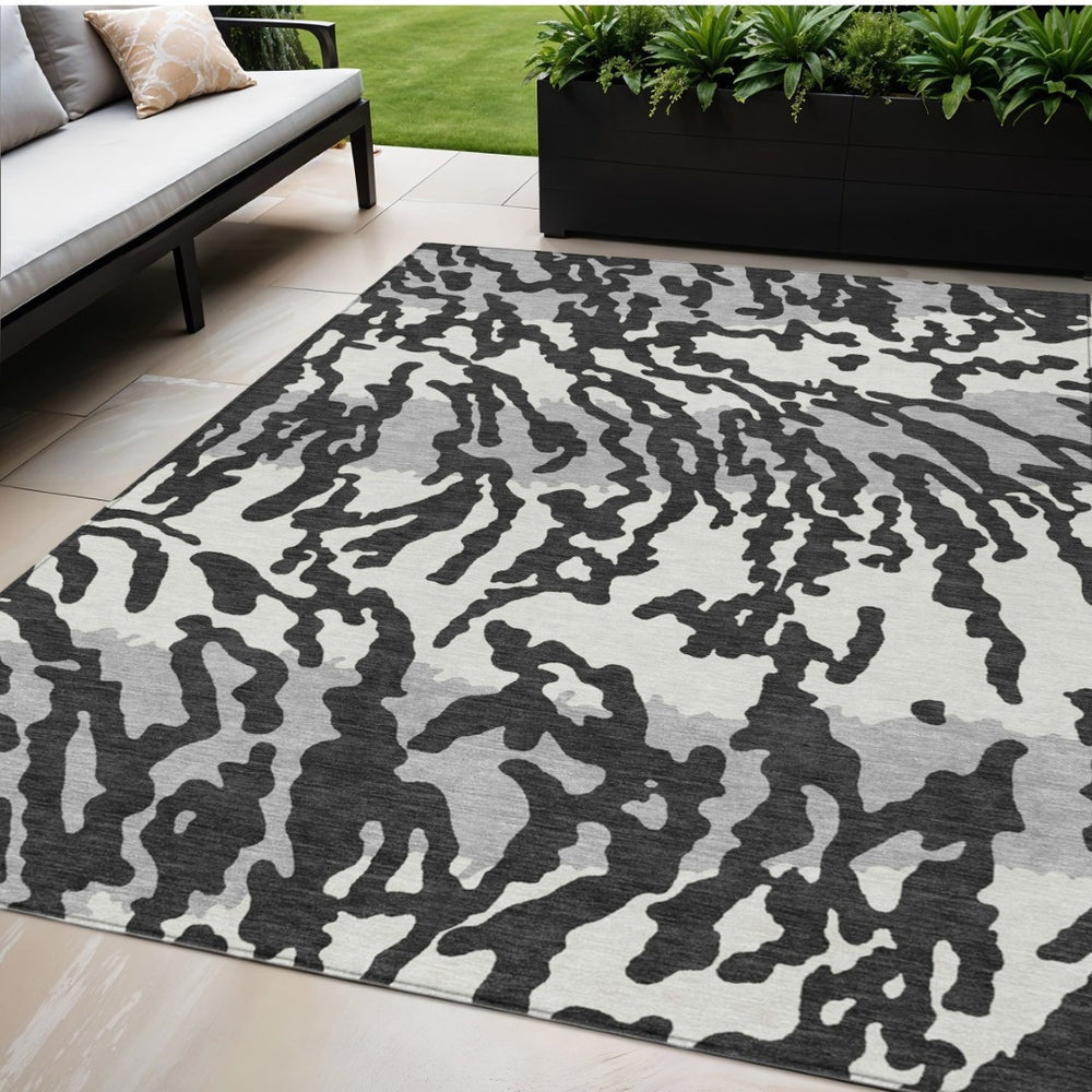 HomeRoots 5' Versatile Animal Print Indoor-Outdoor Area Rug in Black, Gray, and Ivory for Easy Care & Style 5' X 8' 591256