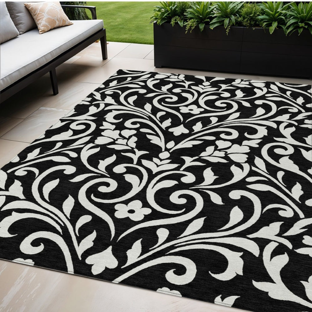 HomeRoots 5' Elegant Black and Ivory Floral Washable Area Rug for Indoor and Outdoor Spaces - Durable Design 5' X 8' 591418