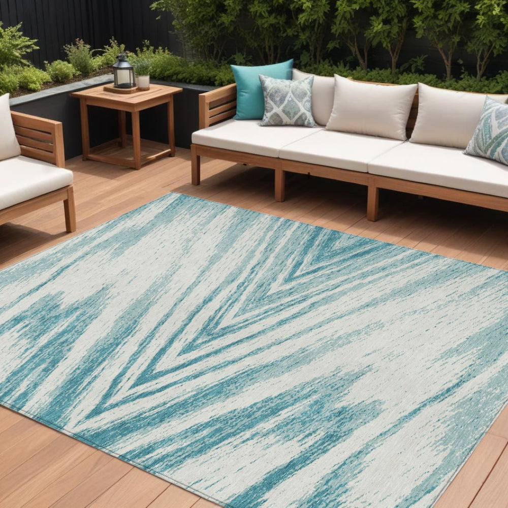 HomeRoots 9' Teal Blue and Ivory Abstract Area Rug – Stylish Washable Indoor/Outdoor Design for Versatile Spaces 9' X 12' 591577