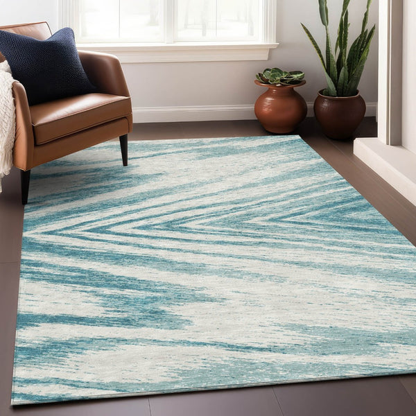 HomeRoots 5' Teal Blue and Ivory Abstract Area Rug – Washable, Stylish, Durable for Indoor and Outdoor Use 10' X 14' 591578