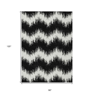 Homeroots 3' Durable Black And Ivory Chevron Indoor Outdoor Area Rug - Stylish, Washable, And Versatile Design 8' X 10' Polyester 591768