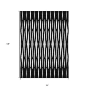 Homeroots 3' Black Ivory And Gray Geometric Indoor Outdoor Area Rug - Stylish, Washable, Stain Resistant Design 3' X 5' Polyester 591855