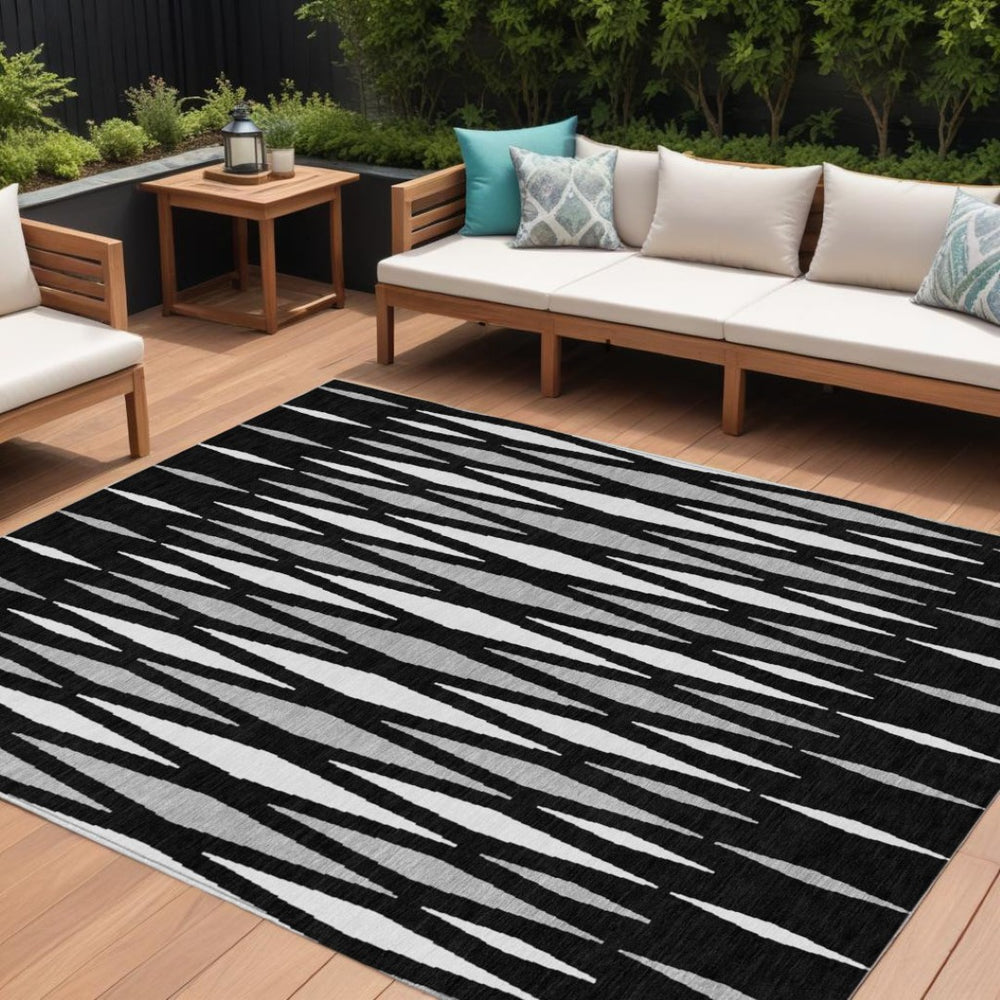 HomeRoots 5' Modern Black, Ivory, and Gray Geometric Washable Area Rug for Indoor and Outdoor Durability 8' X 10' 591858