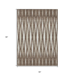 Homeroots 3' Black Ivory And Gray Geometric Indoor Outdoor Area Rug - Stylish, Washable, Stain Resistant Design 5' X 8' Polyester 591868