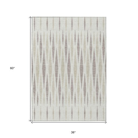 Homeroots 3' Black Ivory And Gray Geometric Indoor Outdoor Area Rug - Stylish, Washable, Stain Resistant Design 3' X 5' Polyester 591891