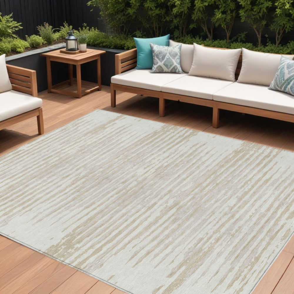 HomeRoots 9' Ivory and Beige Striped Indoor Outdoor Area Rug - Stylish, Washable, Durable for Every Space 9' X 12' 592399