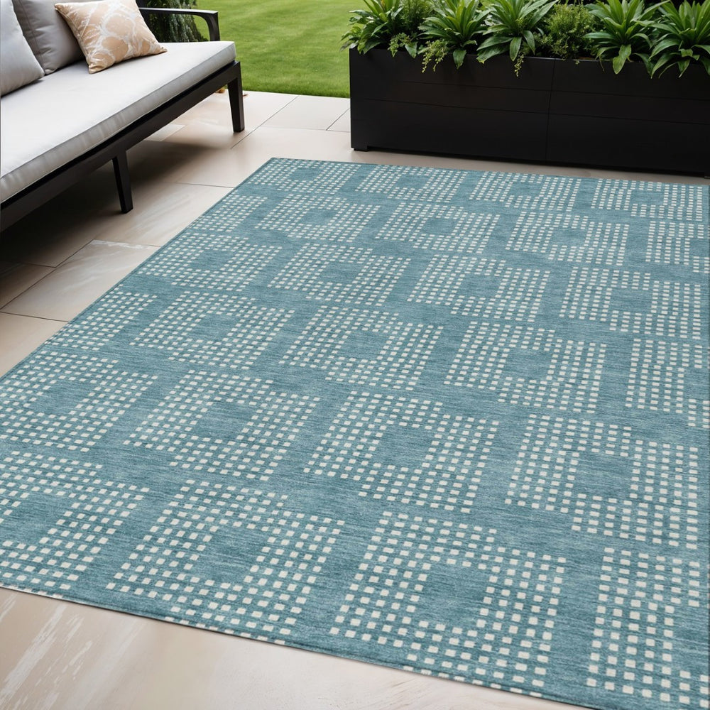 HomeRoots 5' Teal Blue and Ivory Geometric Area Rug for Indoor and Outdoor Spaces – Modern, Durable, Washable Design 5' X 8' 592576