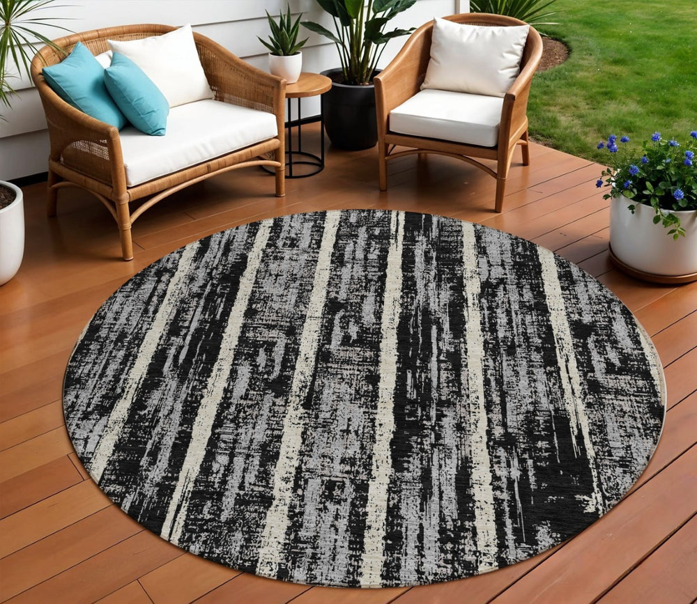 HomeRoots 5' Stylish Black Gray and Ivory Striped Washable Area Rug for Indoor and Outdoor Living Spaces 8' Round 592691