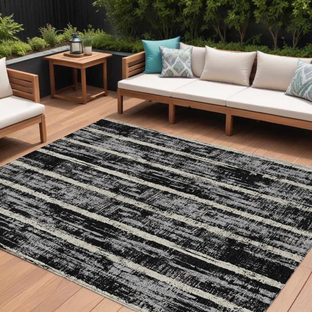 HomeRoots 9' Stylish Black Gray and Ivory Striped Washable Area Rug for Indoor and Outdoor Durability 9' X 12' 592693