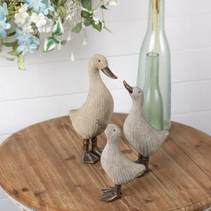 HomeRoots Set of Four Brown Resin Figurines - Modern Tabletop Sculptures for Home Decor & Thoughtful Gifts 592958