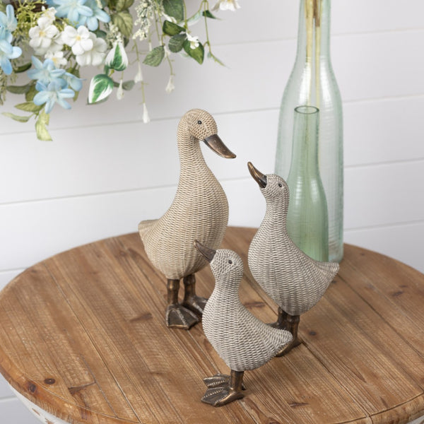 HomeRoots Set of Four Brown Resin Figurines - Modern Tabletop Sculptures for Home Decor & Thoughtful Gifts 592958