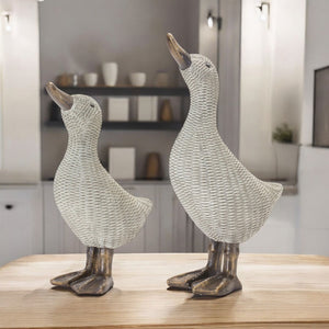 HomeRoots Set of Four Brown Resin Figurines - Modern Tabletop Sculptures for Home Decor & Thoughtful Gifts 592958