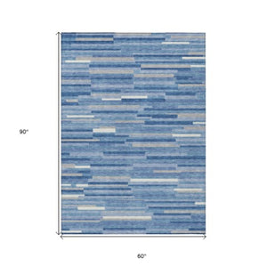 Homeroots 3' Brown And Ivory Striped Washable Area Rug - Stylish Comfort For Indoor And Outdoor Spaces 5' X 8' Polyester 593145