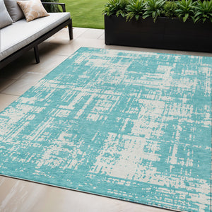 Homeroots 3' Aqua And Ivory Abstract Washable Area Rug For Indoor Outdoor Spaces - Durable And Stylish Design 5' X 8' Polyester 593169