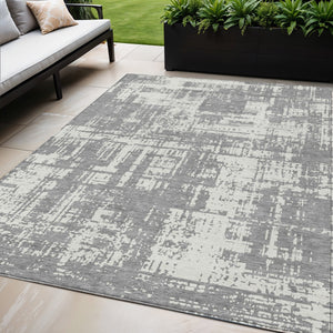 Homeroots 3' Aqua And Ivory Abstract Washable Area Rug For Indoor Outdoor Spaces - Durable And Stylish Design 5' X 8' Polyester 593199