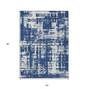 Homeroots 3' Aqua And Ivory Abstract Washable Area Rug For Indoor Outdoor Spaces - Durable And Stylish Design 5' X 8' Polyester 593211