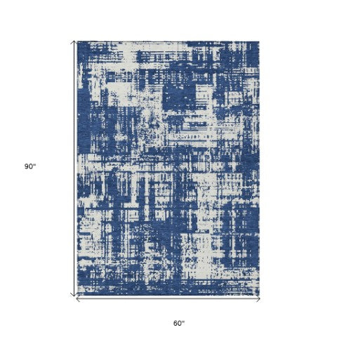 Homeroots 3' Aqua And Ivory Abstract Washable Area Rug For Indoor Outdoor Spaces - Durable And Stylish Design 5' X 8' Polyester 593211