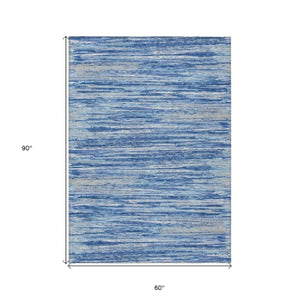 Homeroots 3' Beige Brown Ivory Striped Washable Area Rug - Durable Indoor Outdoor Accent For Any Space 5' X 8' Polyester 593259