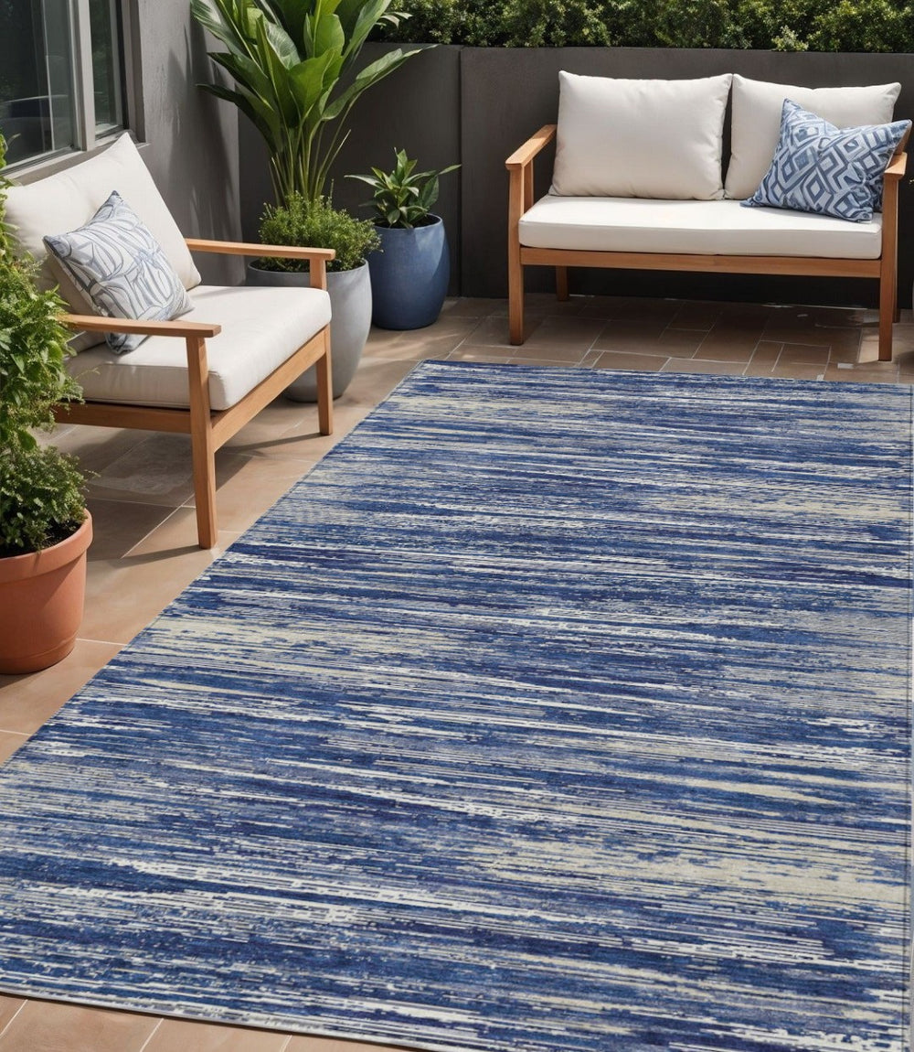 HomeRoots 5' Navy Blue and Ivory Striped Area Rug - Durable, Washable Indoor/Outdoor Accent for Every Space 5' X 8' 593289