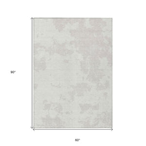 Homeroots 3' Artichoke Green Abstract Washable Indoor Outdoor Area Rug - Stylish, Durable, And Easy To Clean 5' X 8' Polyester 593355