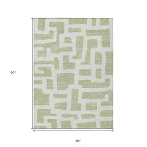 Homeroots 3' Artichoke Green Abstract Area Rug - Stylish, Washable Indoor-outdoor Design For All Spaces 5' X 8' Polyester 593817