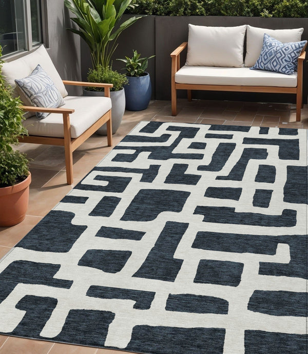 Homeroots 3' Artichoke Green Abstract Area Rug - Stylish, Washable Indoor-outdoor Design For All Spaces 5' X 8' Polyester 593823