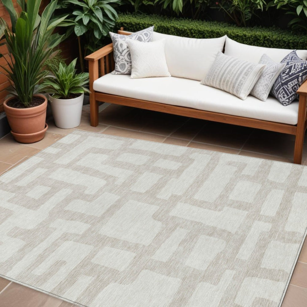 HomeRoots 9' Ivory and Beige Abstract Area Rug - Durable, Washable Design for Indoor & Outdoor Spaces 9' X 12' 593862