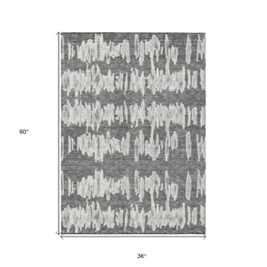 Homeroots 3' Stylish Black Ivory And Gray Striped Washable Area Rug For Indoor And Outdoor Versatility 3' X 5' Polyester 594022