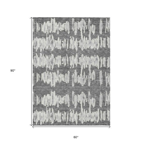 Homeroots 3' Stylish Black Ivory And Gray Striped Washable Area Rug For Indoor And Outdoor Versatility 5' X 8' Polyester 594023