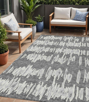 Homeroots 3' Stylish Black Ivory And Gray Striped Washable Area Rug For Indoor And Outdoor Versatility 5' X 8' Polyester 594023