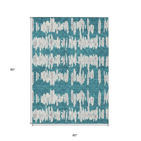 Homeroots 3' Stylish Black Ivory And Gray Striped Washable Area Rug For Indoor And Outdoor Versatility 5' X 8' Polyester 594065