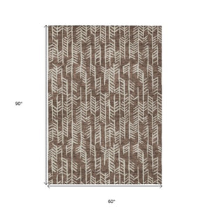 Homeroots 3' Beige And Ivory Tribal Washable Indoor Outdoor Area Rug - Durable, Stylish, Perfect For Any Space 5' X 8' Polyester 594089