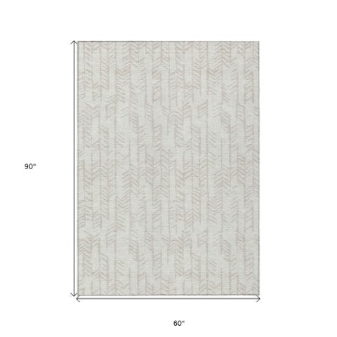 Homeroots 3' Beige And Ivory Tribal Washable Indoor Outdoor Area Rug - Durable, Stylish, Perfect For Any Space 5' X 8' Polyester 594113