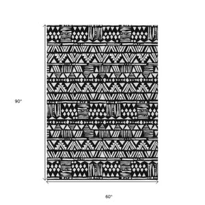 Homeroots 3' Black And Ivory Southwestern Washable Area Rug - Stylish Indoor/Outdoor Design For Any Space 5' X 8' Polyester 594149