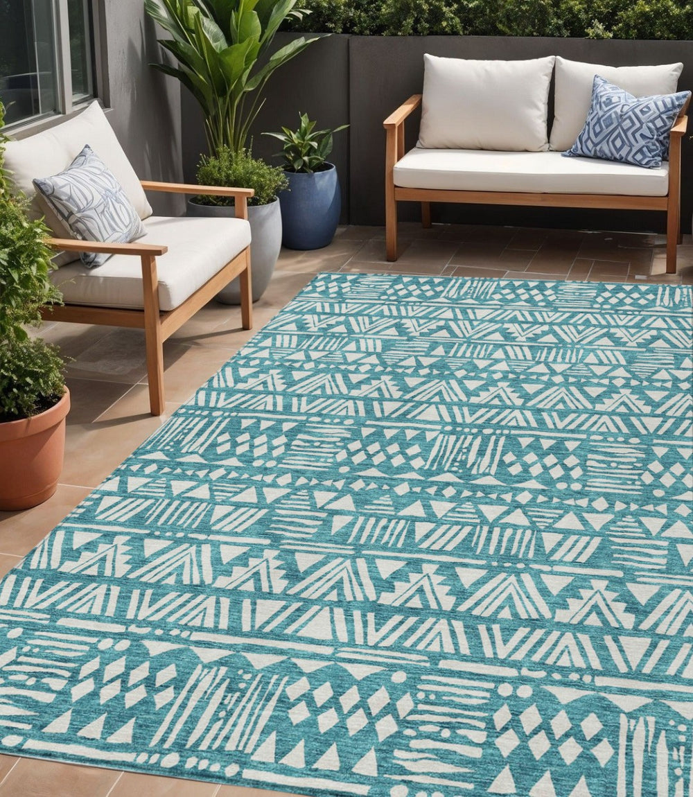 HomeRoots 5' Teal Blue and Ivory Southwestern Area Rug - Durable, Washable, Stylish Accent for Indoor/Outdoor Use 5' X 8' 594191