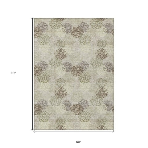 Homeroots 3' Beige Green And Ivory Polka Dot Washable Area Rug - Perfect For Indoor Or Outdoor Spaces! 5' X 8' Polyester 594209