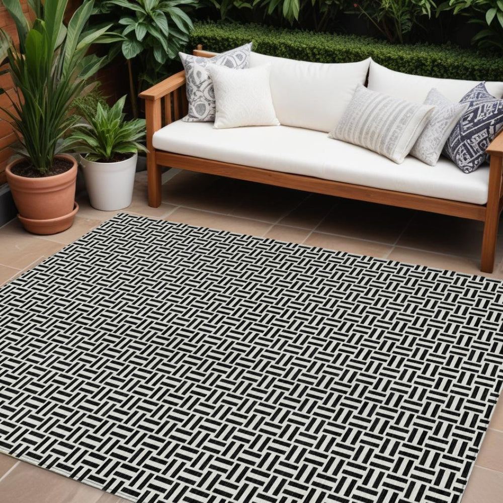 HomeRoots 5' Black And Ivory Geometric Area Rug - Versatile Indoor Outdoor Mat for Easy Care and Style 10' X 14' 594448