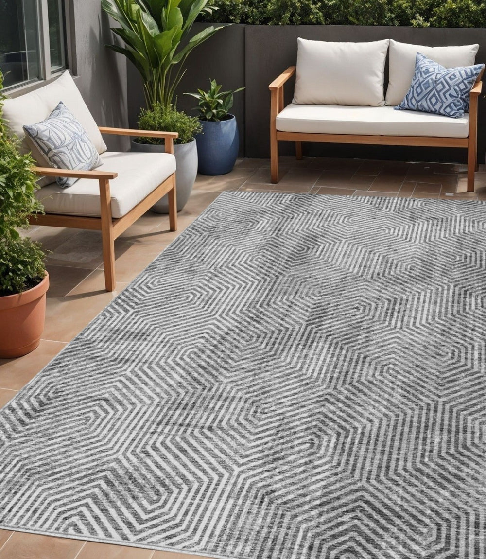 HomeRoots 5' Stylish Silver and Gray Geometric Washable Area Rug for Indoor and Outdoor High-Traffic Spaces 5' X 8' 594582