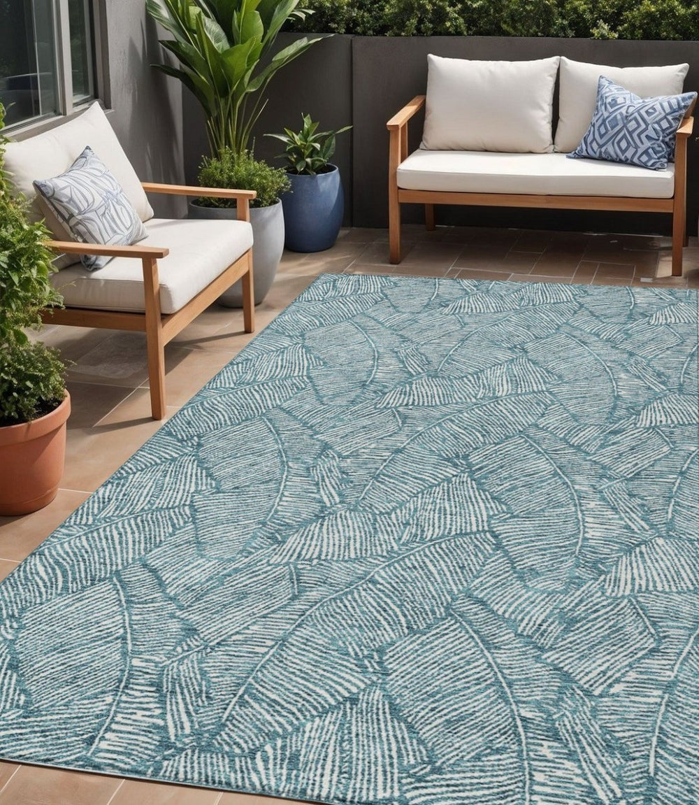 HomeRoots 5' Teal Blue and Ivory Floral Area Rug - Durable, Washable Design for Indoor and Outdoor Spaces 5' X 8' 594666