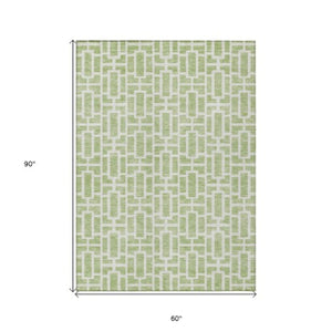 Homeroots 3' Artichoke Green And Ivory Geometric Washable Area Rug For Indoor And Outdoor Spaces 5' X 8' Polyester 594822