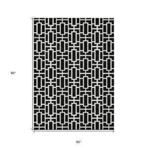 Homeroots 3' Artichoke Green And Ivory Geometric Washable Area Rug For Indoor And Outdoor Spaces 5' X 8' Polyester 594834