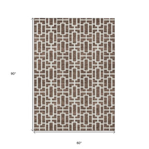 Homeroots 3' Artichoke Green And Ivory Geometric Washable Area Rug For Indoor And Outdoor Spaces 5' X 8' Polyester 594840