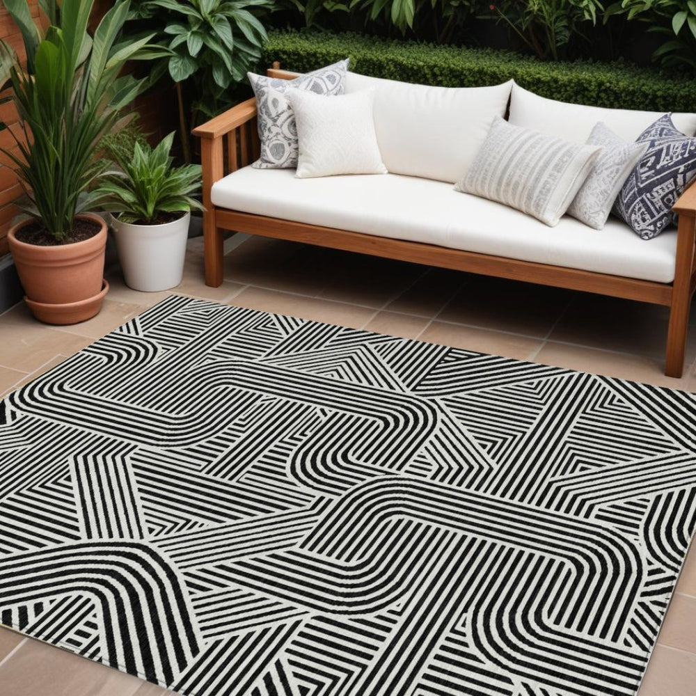 HomeRoots 9' X 12' Black And Ivory Abstract Area Rug - Washable, Durable, Modern Design for Indoor & Outdoor Use 594909
