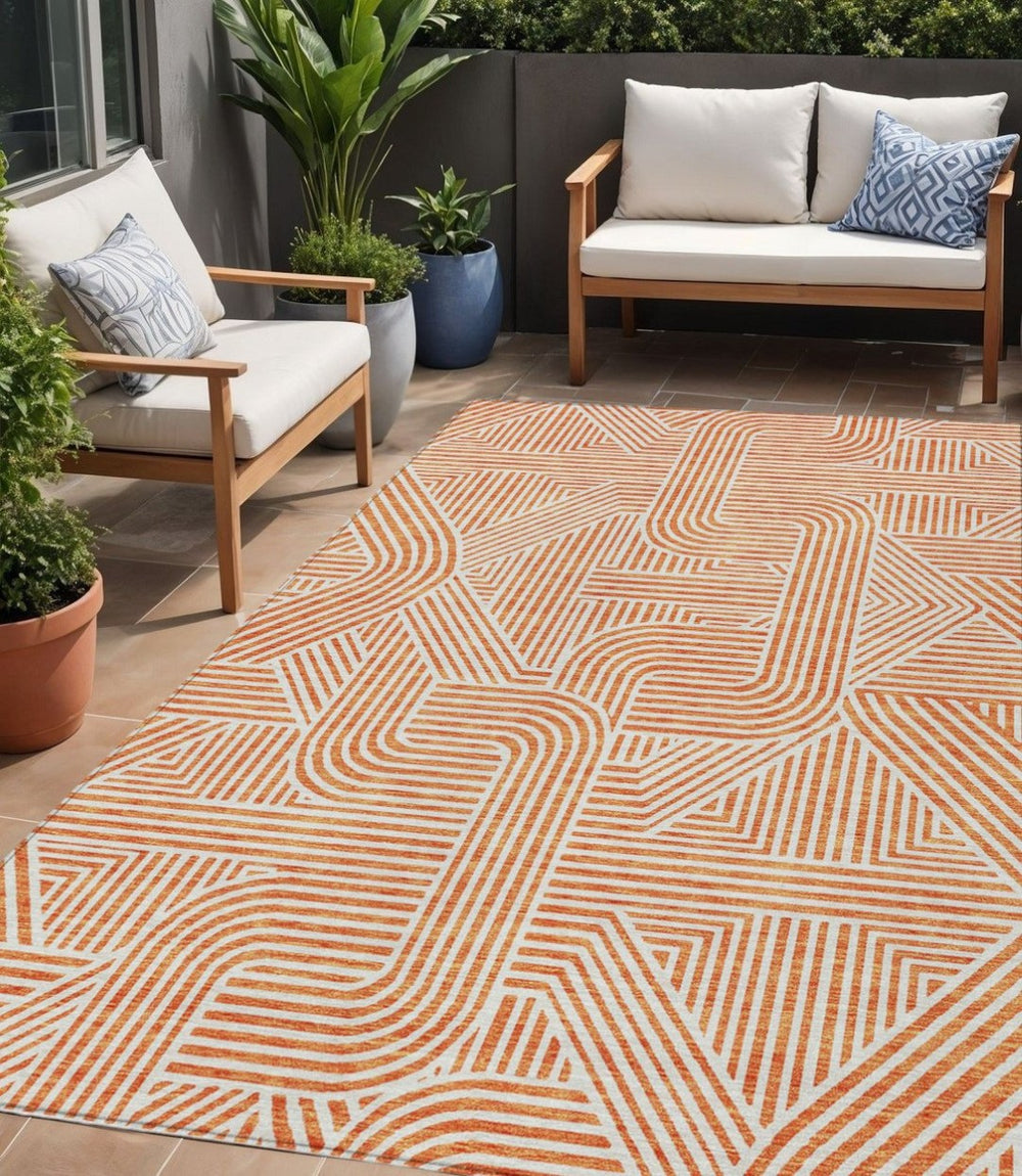 HomeRoots 5' Abstract Orange and Ivory Area Rug – Durable, Washable, Stylish for Indoor and Outdoor Spaces 5' X 8' 594948
