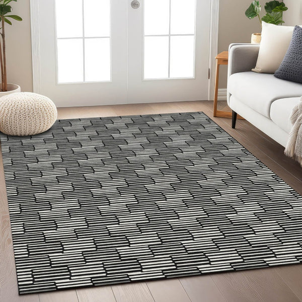 HomeRoots 5' Black and Ivory Geometric Area Rug - Stylish, Washable Indoor/Outdoor Design for Versatile Spaces 8' X 10' 594980