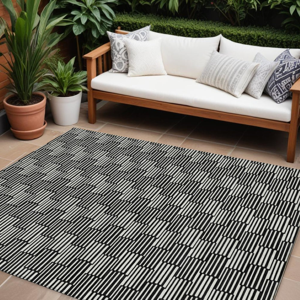 HomeRoots 9' X 12' Geometric Black & Ivory Washable Area Rug – Durable Indoor/Outdoor Design for Modern Spaces 594981