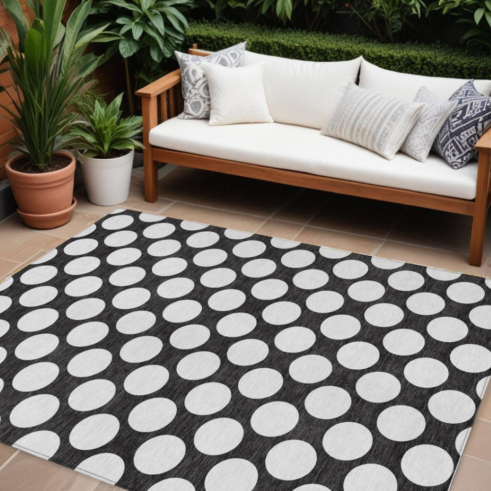 HomeRoots 5' Black and Ivory Polka Dot Area Rug - Durable, Washable Design for Indoor and Outdoor Spaces 8' X 10' 595208